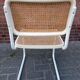 Cesca dining room chair designed by Marcel Breuer