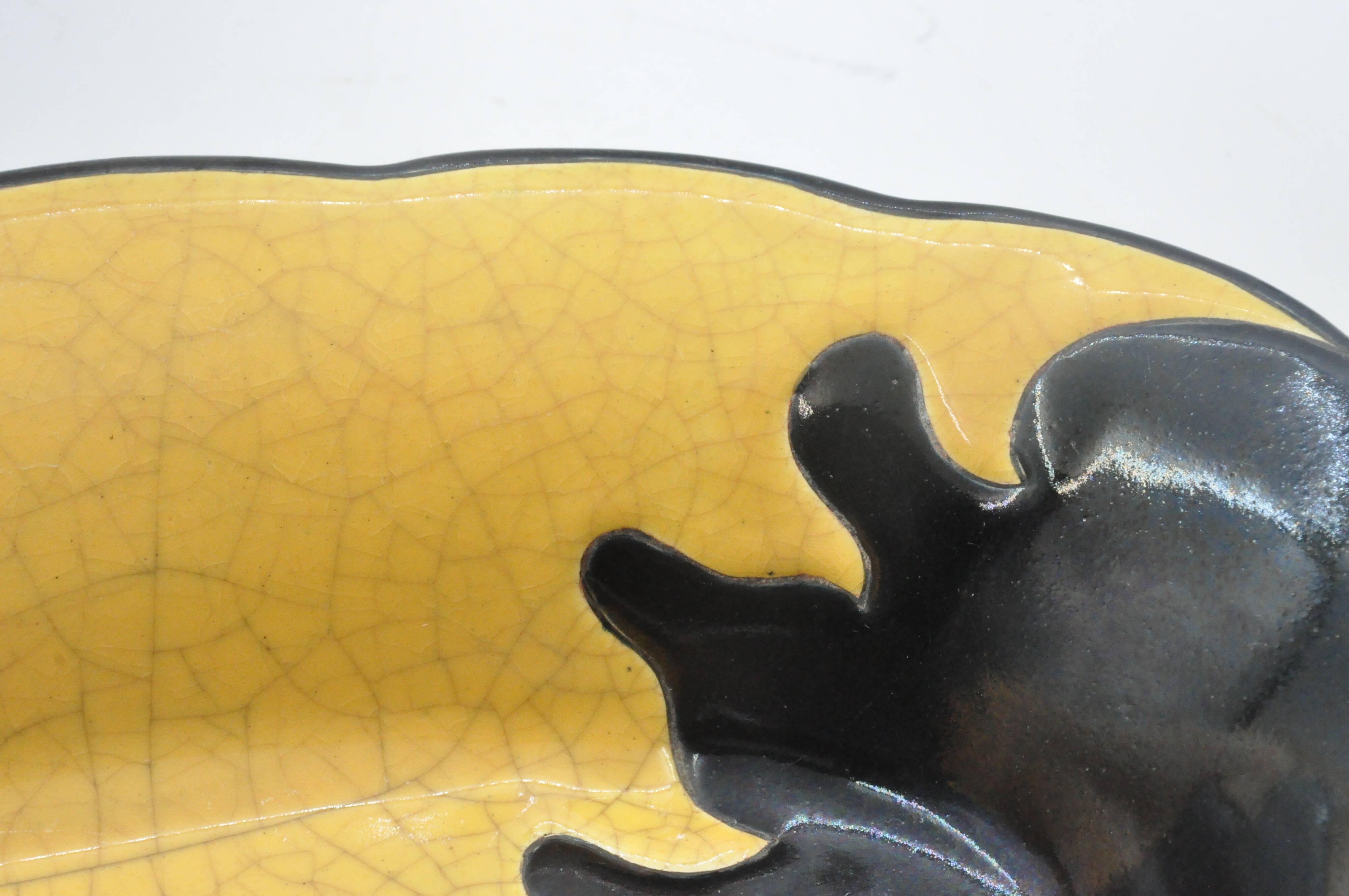 Old dish in enamels from longwy ombre et lumière collection ceramic design