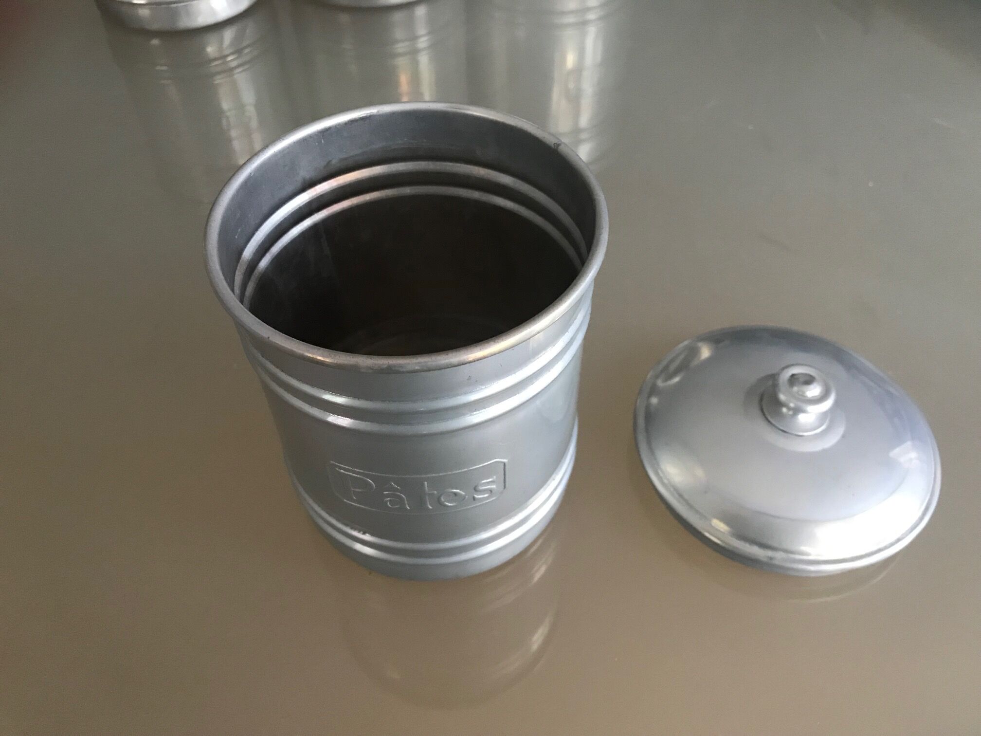 Series of 6 aluminum grocery jars