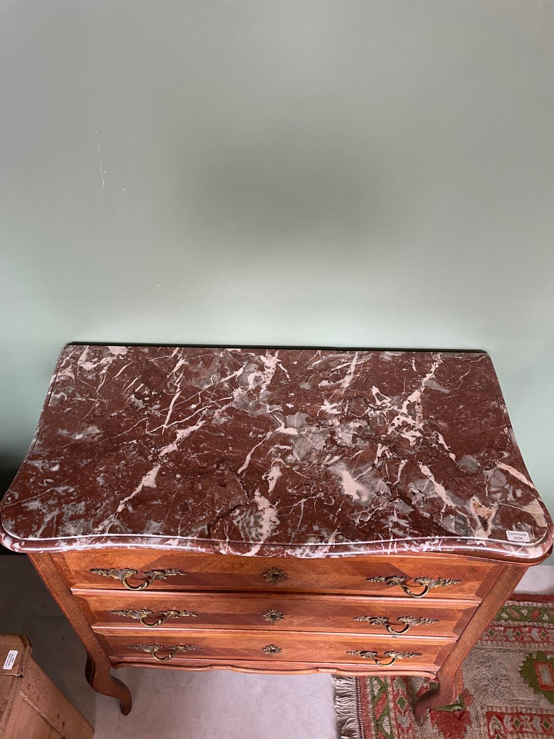 Small Louis XV chest of drawers – veined pink marble