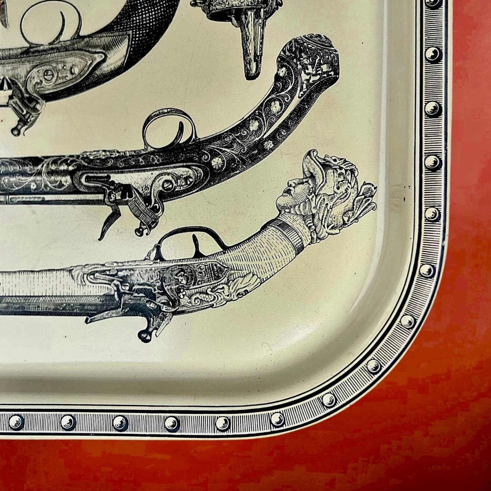 Vintage Fornasetti plateau with antique pistols décor – Italian design from the 1960s.
