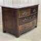 Regency commode in amaranth with an 18th-century marble top.