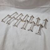 12 silver knife holders from 1970