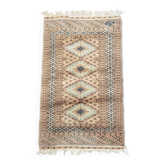 Authentic hand-knotted Pakistani wool rug 110 × 62 cm.