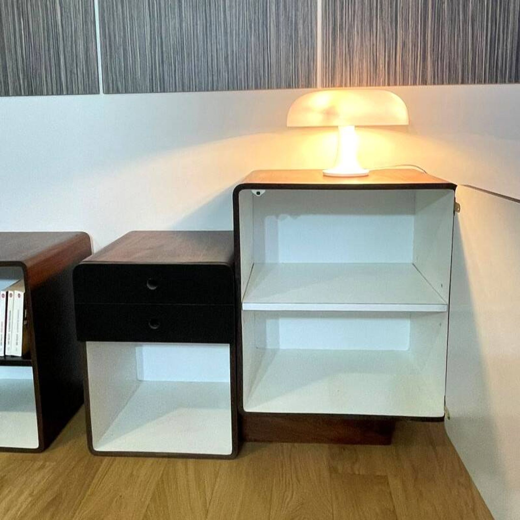 Vintage 1970s Space Age bedside tables in wood and black.