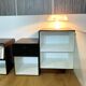 Vintage 1970s Space Age bedside tables in wood and black.