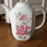 Vintage porcelain coffee or teapot with milk jug