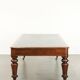 Antique English library table / writing table / desk from the 19th century
