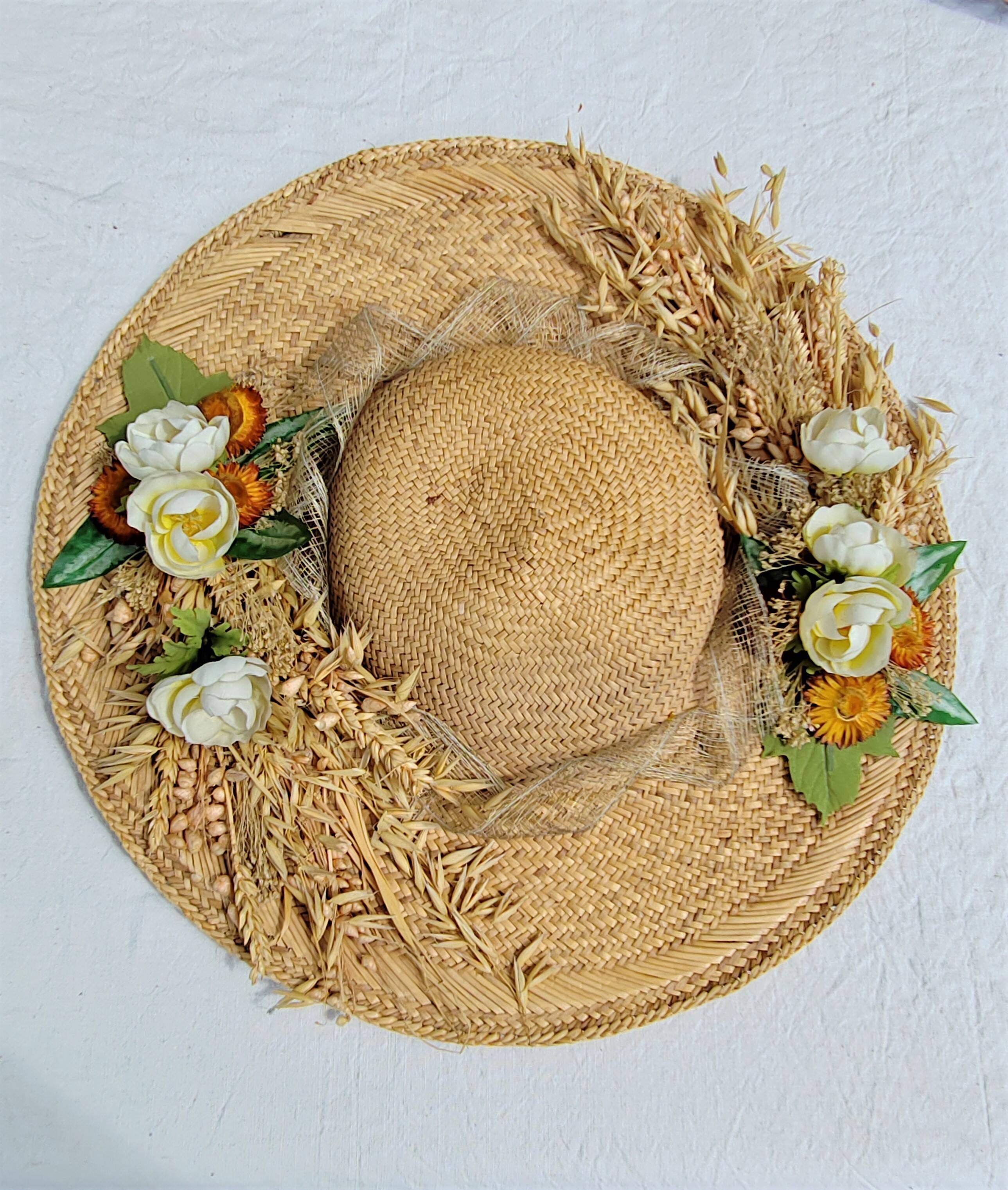 Decorative straw hat with dried flowers
