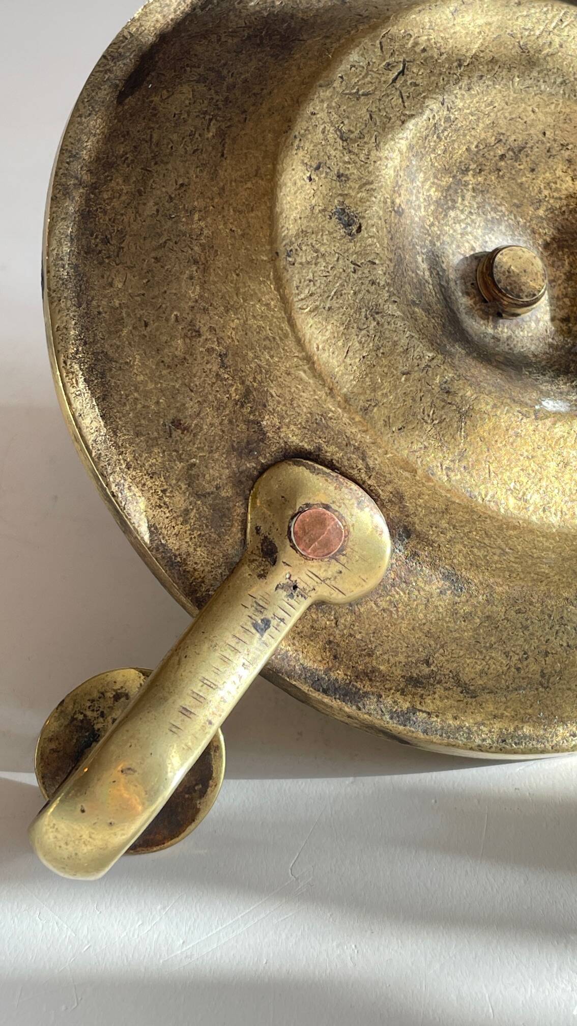 Antique solid bronze hand candlestick