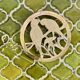 Small brass trivet with parrots or inseparable birds