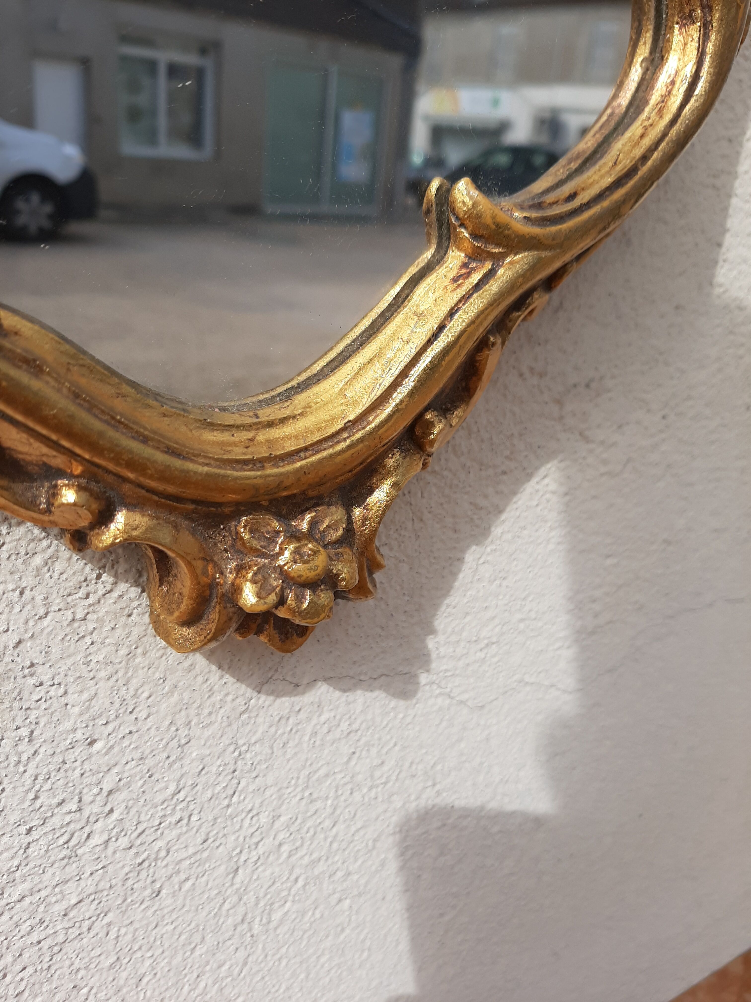 Pair of mirror Baroque style Louis XV gilded