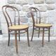 Pair of canned bistro chairs Thonet ZPM Radomsko in curved wood
