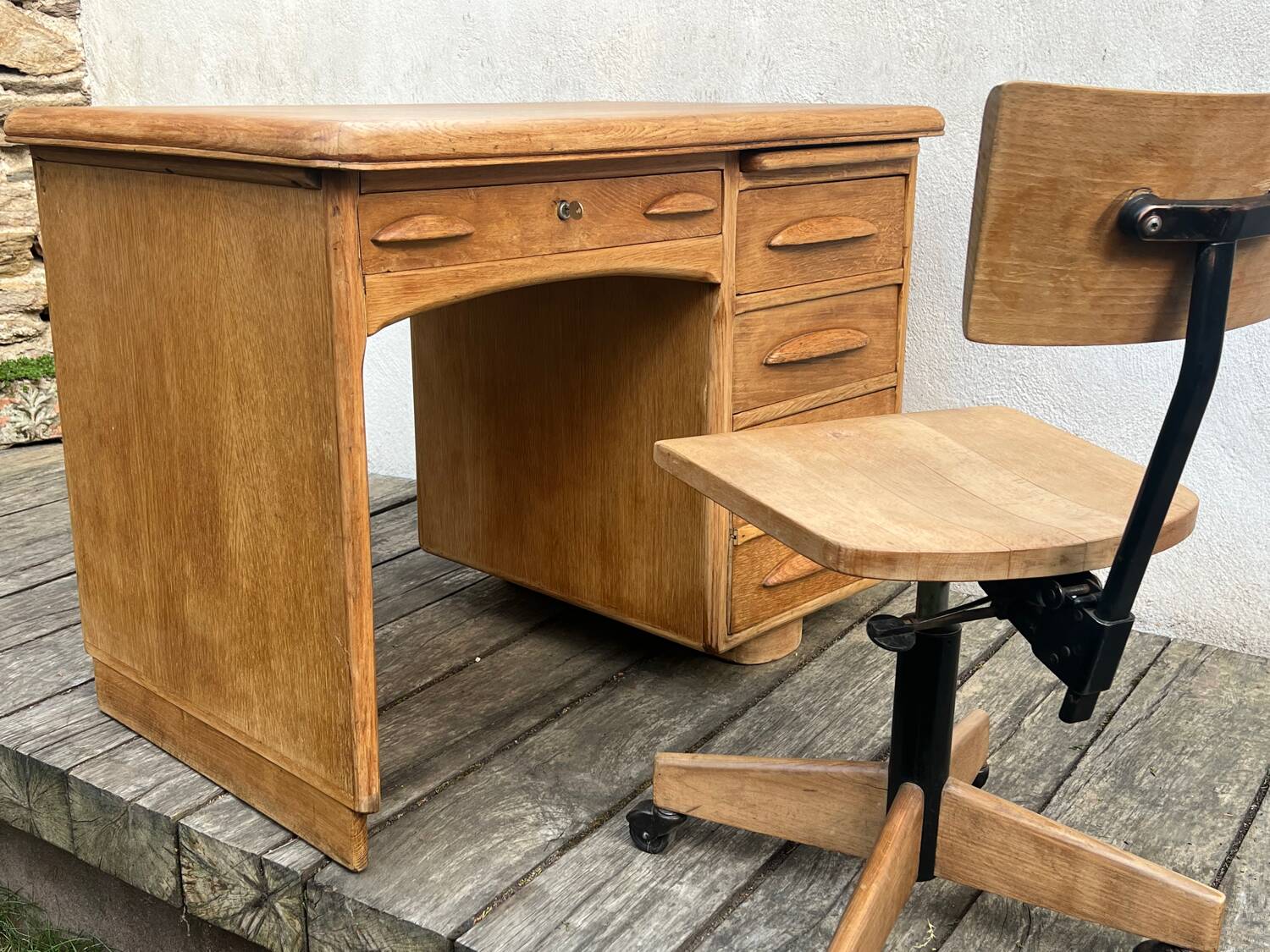 Antique light oak desk from the 1950s with 4 drawers