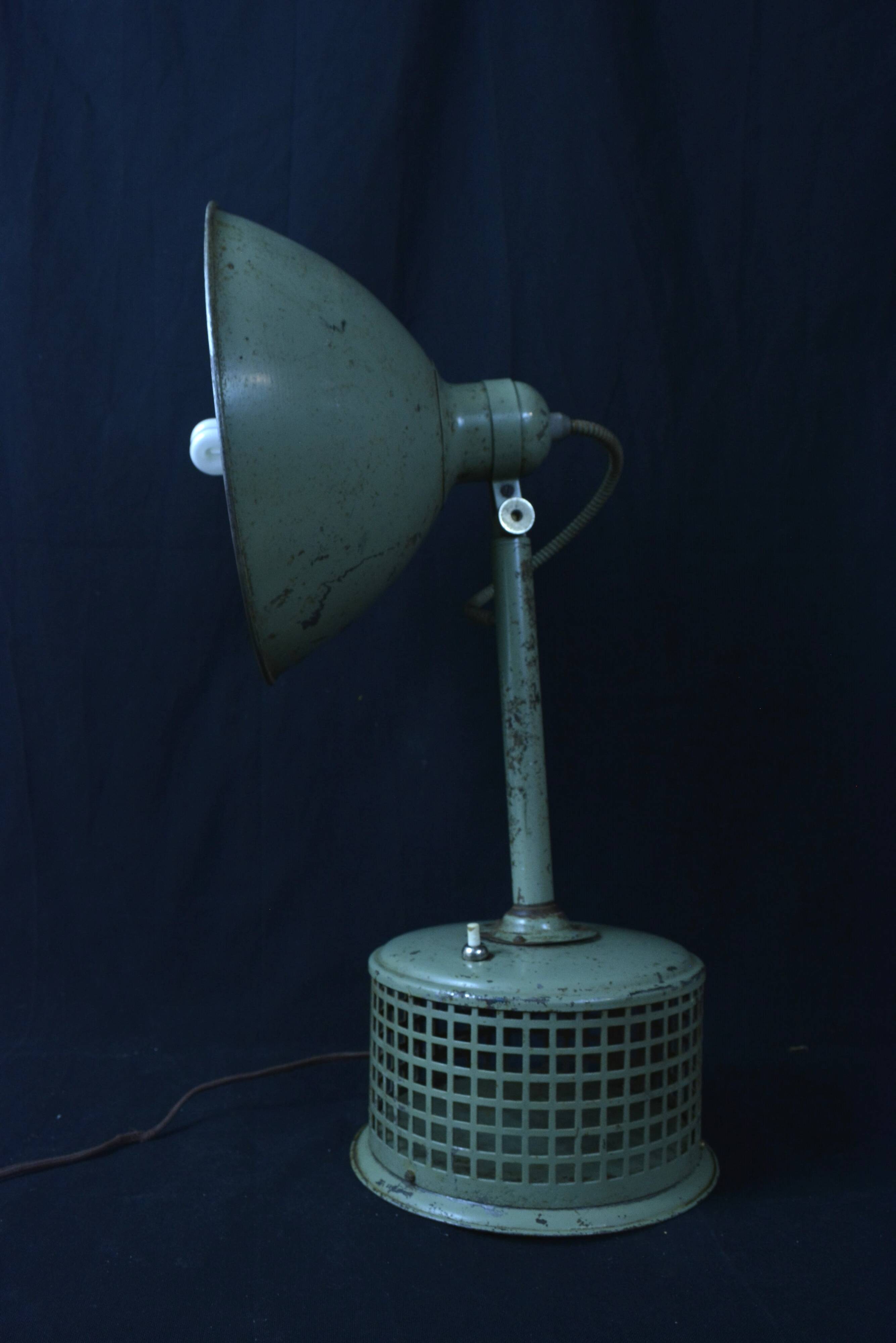 Industrial metal parabola lamp.