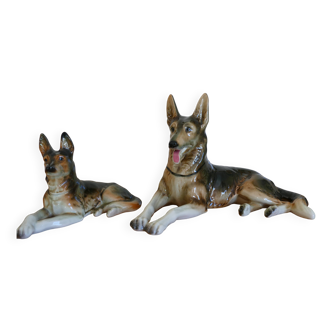 Two ceramic German Shepherd dogs