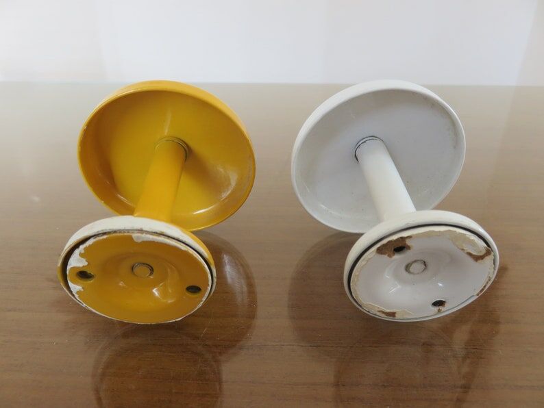 2 wall mounted coat racks in yellow and white metal 70s 80s