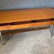 Bureau quatre tiroirs 1960 sur pieds tubulaires chromes
