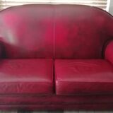 Patinated red club sofa