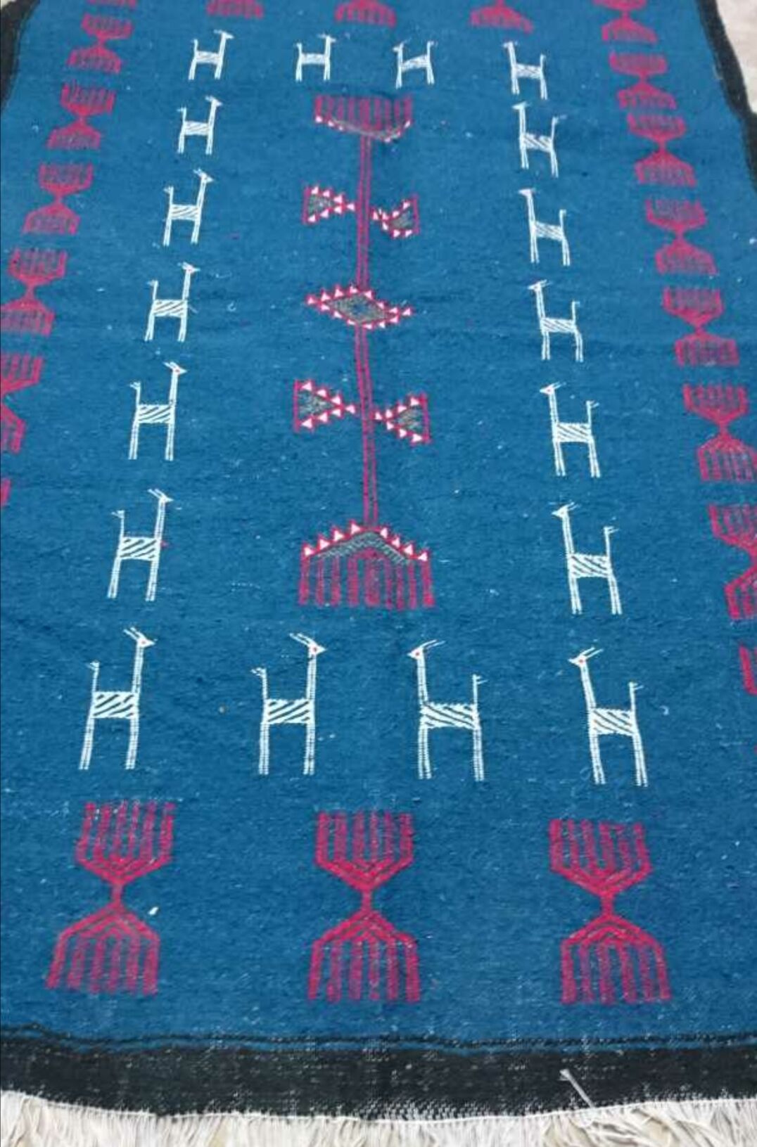 Tapis bleu en laine 195x110cm