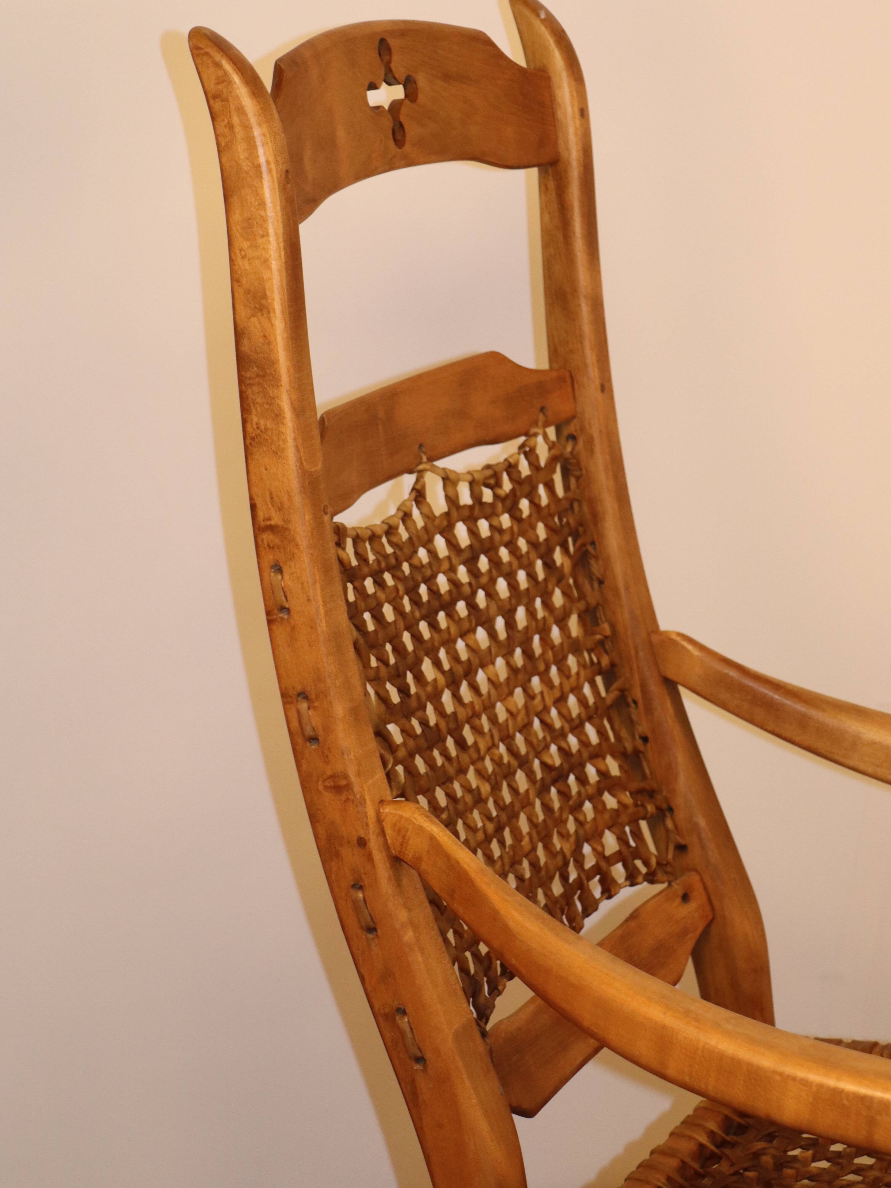 Vintage rocking chair in solid wood 1950