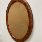 Oval frame imitation magnifying glass