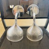 Many Kartell wall lamps.