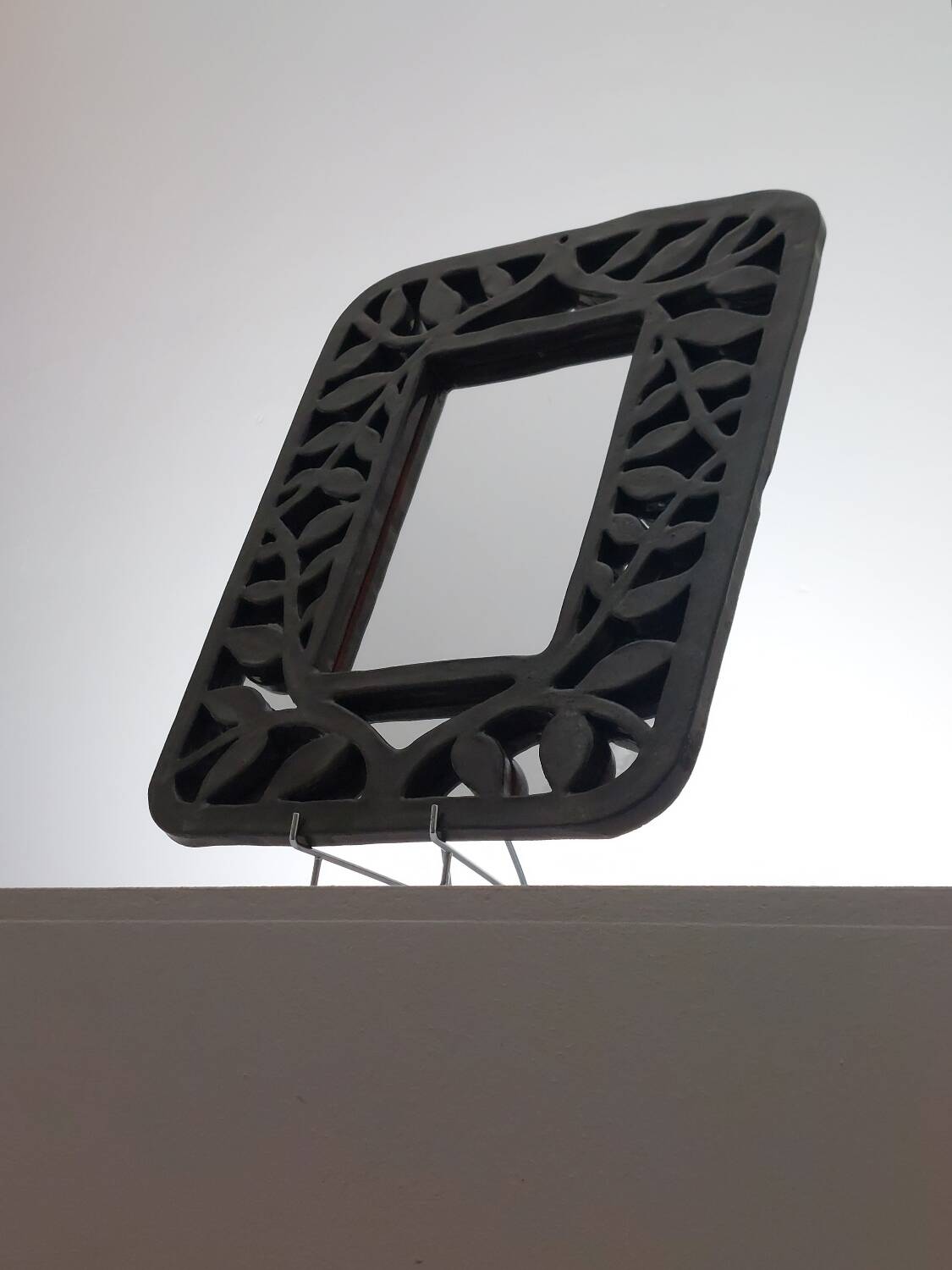 Unique vintage floral ceramic wall mirror by an artist