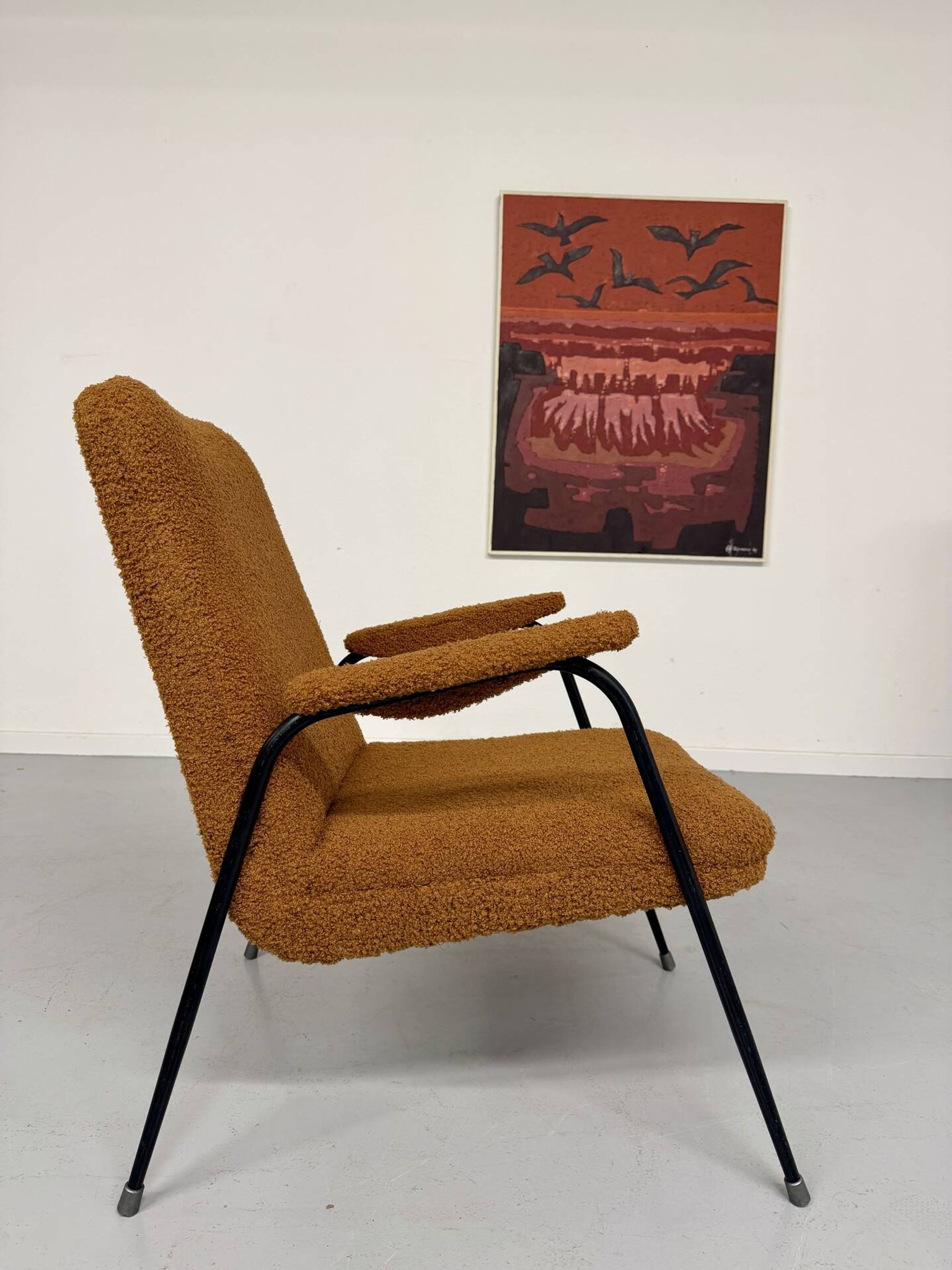Vintage metal armchair with orange boucle fabric, French design from the 1950s.