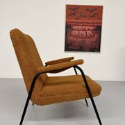 Vintage metal armchair with orange boucle fabric, French design from the 1950s.