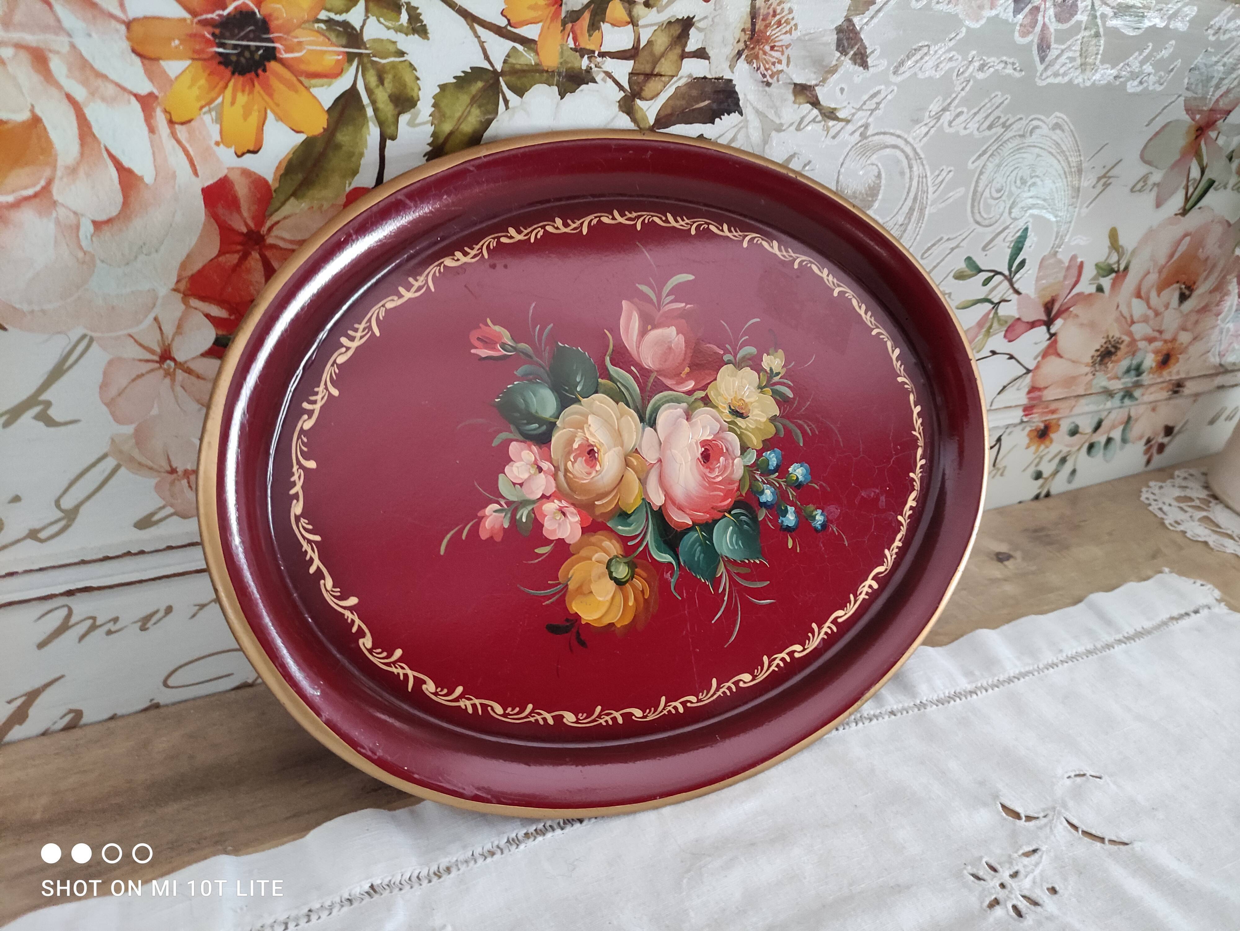 Russian plate in painted sheet metal burgundy old pink decoration and golden frieze