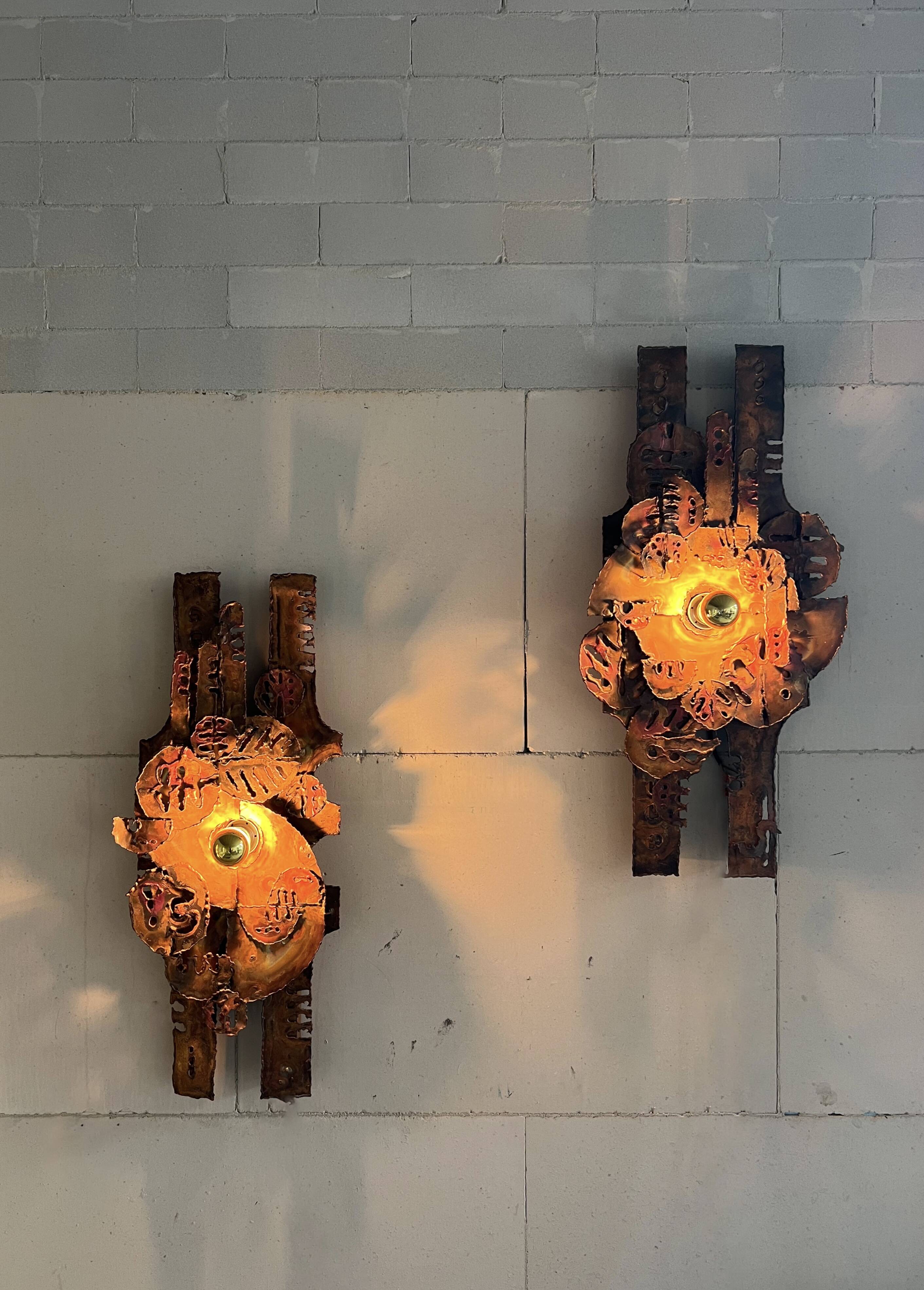 Raw expressive wall sconces by Francesco Pasinato