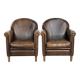 Characterful set of two sheepskin design armchairs with beautiful patina