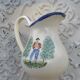1 St Clément earthenware pouring jug decorated with characters