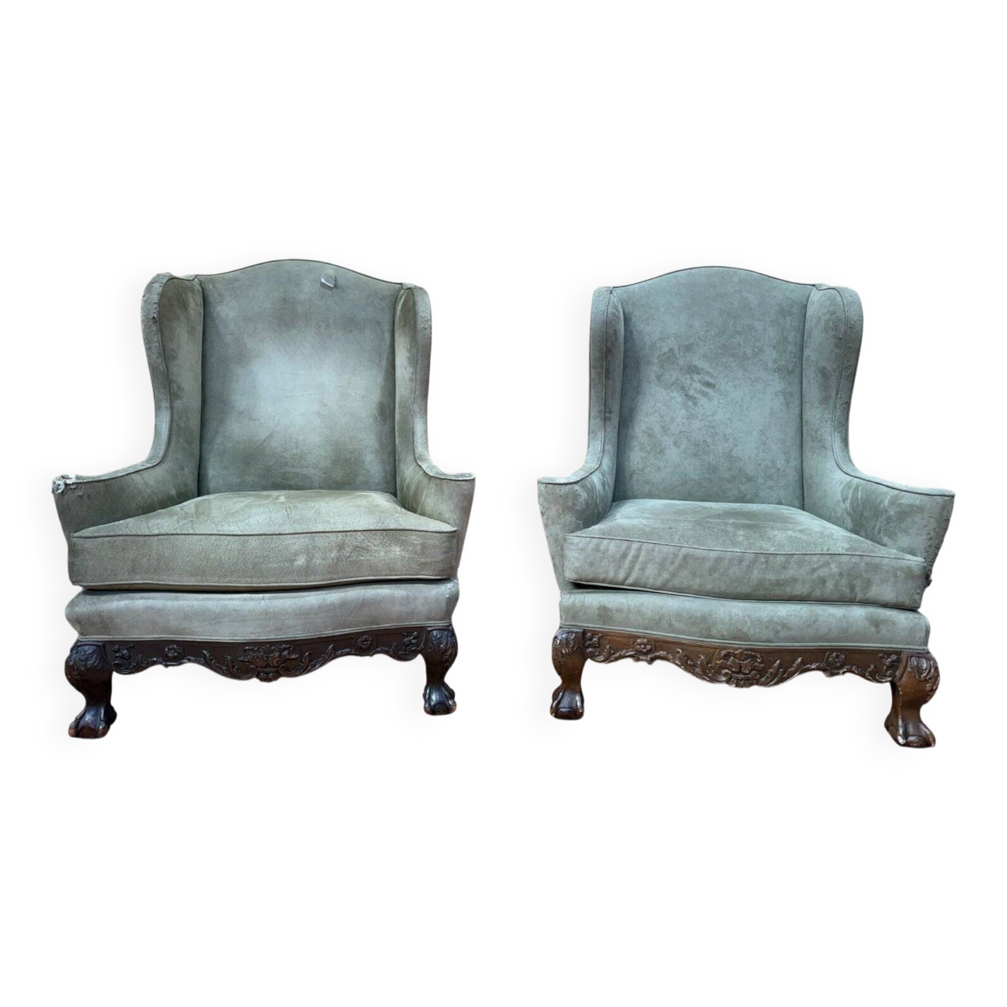 Pair of wingback armchairs in George III style – Carved wood – 18th century.