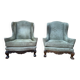 Pair of wingback armchairs in George III style – Carved wood – 18th century.