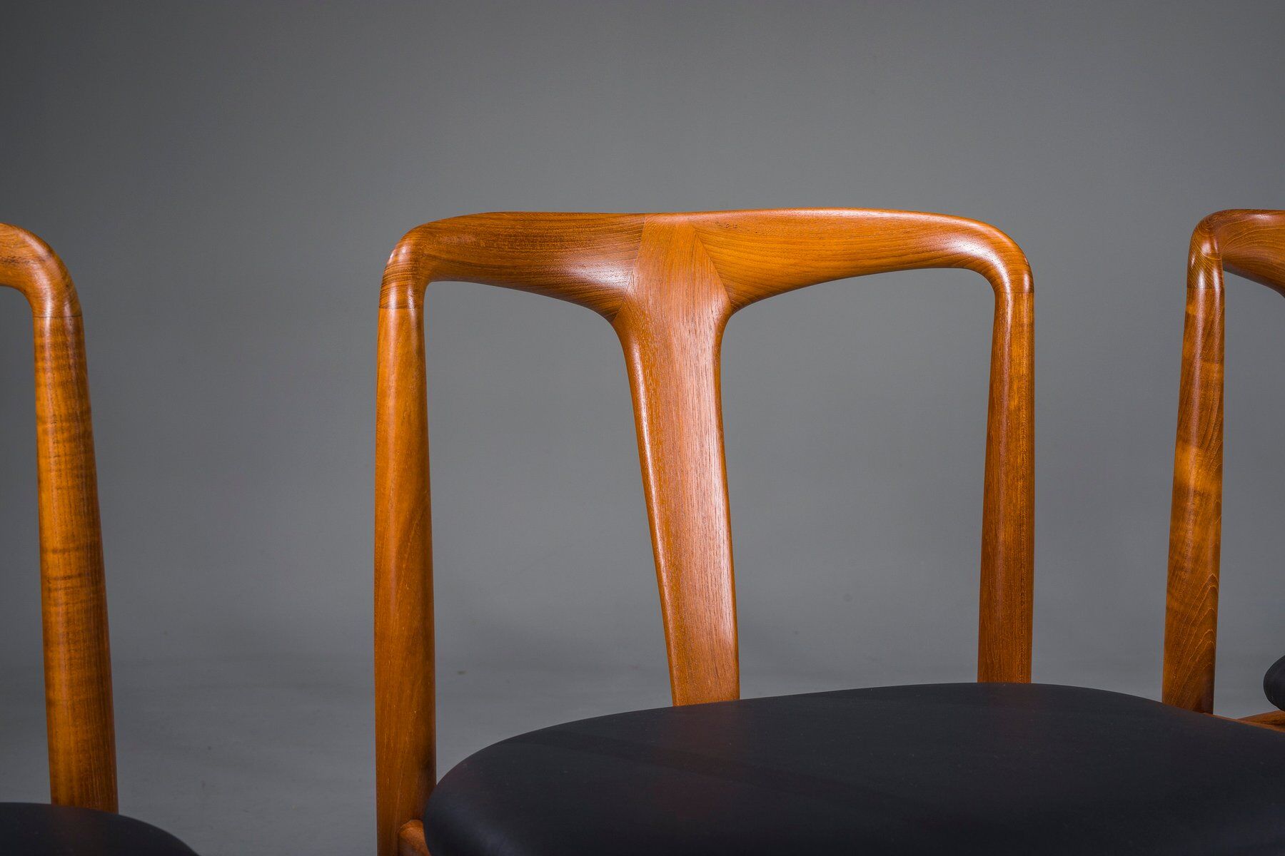 Juliane dining chairs in teak and black leather by Johannes Andersen for Uldum Møbelfabrik, Denmark, 1960s, set of 6