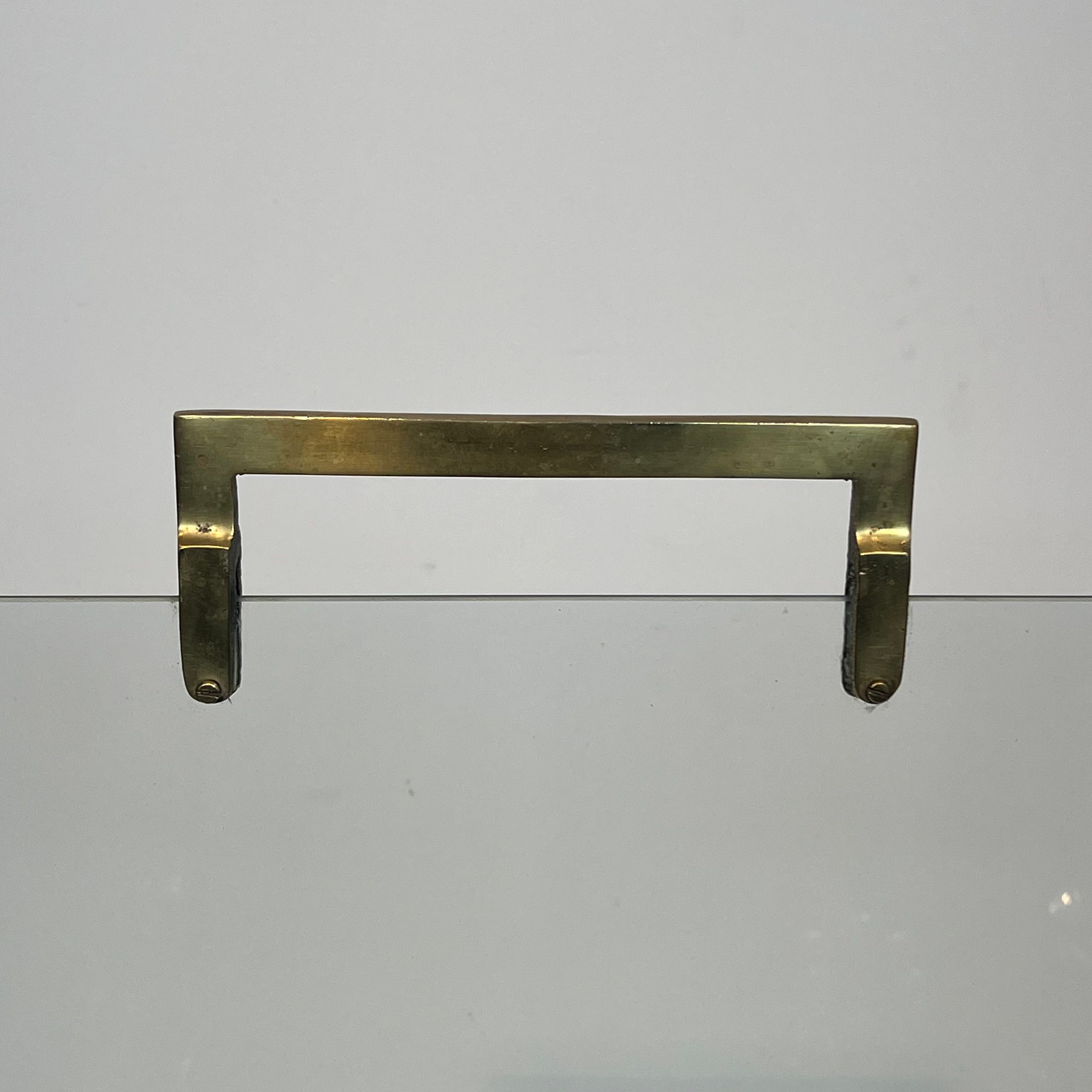 Glass and brass fire screen