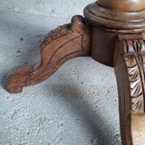 Old round table on centre foot