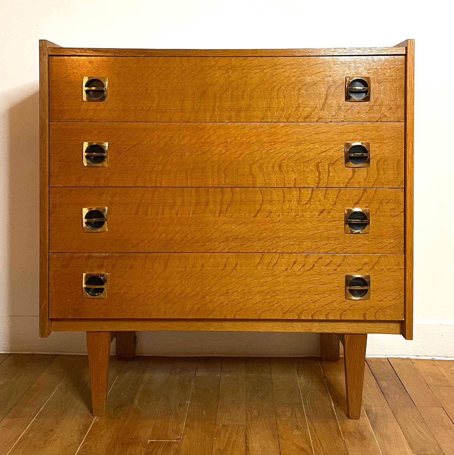 Vintage wooden chest of drawers with compass feet