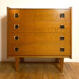 Vintage wooden chest of drawers with compass feet