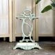 Art Nouveau umbrella stand in water green cast iron