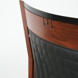 Art Deco design armchair with black leather with decorative stitching