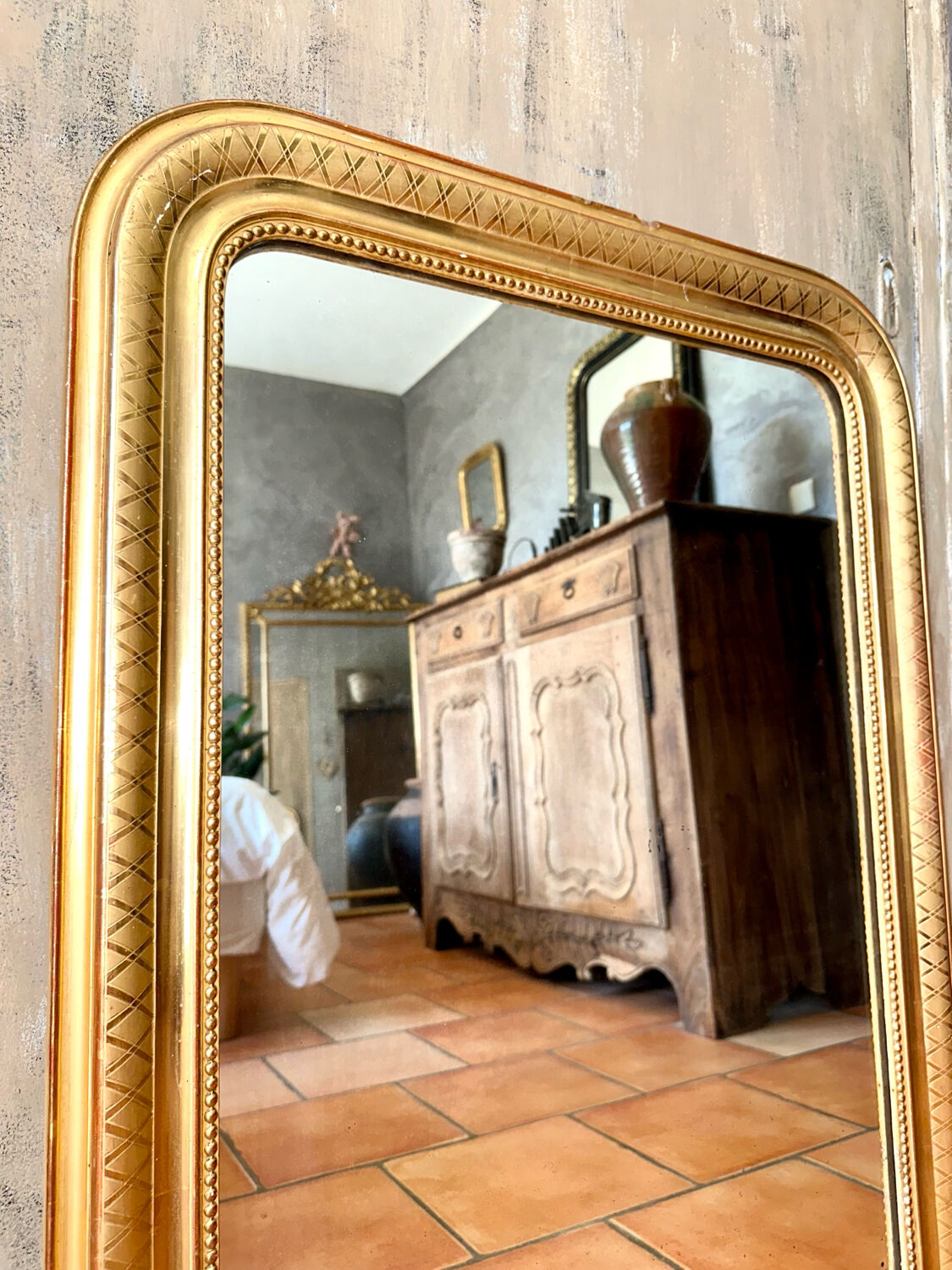 Louis-Philippe antique gilded mirror from the 19th century.