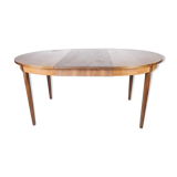 Dining table in teak with extensions, of Danish design from the 1960s.