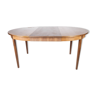 Dining table in teak with extensions, of Danish design from the 1960s.