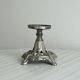 Candle holder with sculpted metal base, antique.