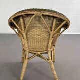 Rattan and wicker cabriolet-style armchair with green and red edging