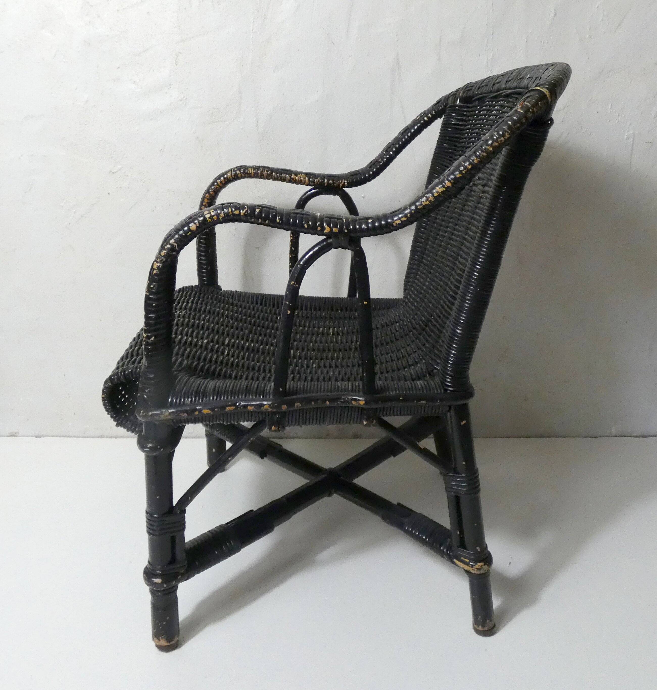 Vintage children's size rattan armchair