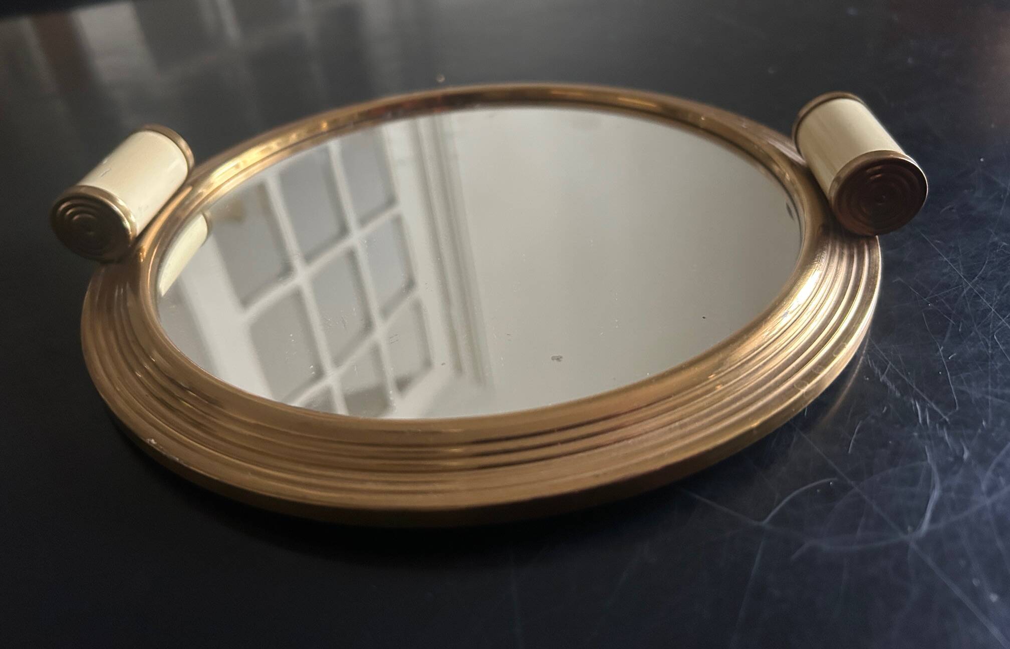 Art Deco mirror and brass tray